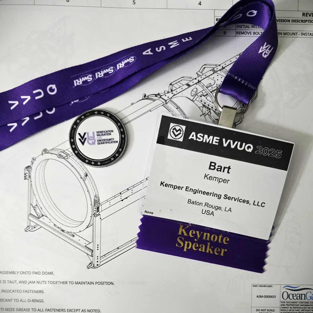 Bart Kemper's VVUQ conference name tag and a "challenge coin"